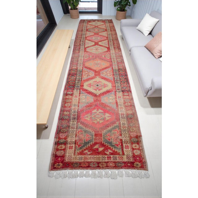 This rare extra-long vintage Oushak runner (3 ft 1 in x 13 ft 9 in) is a one-of-a-kind hand-knotted wool pile on a cotton...