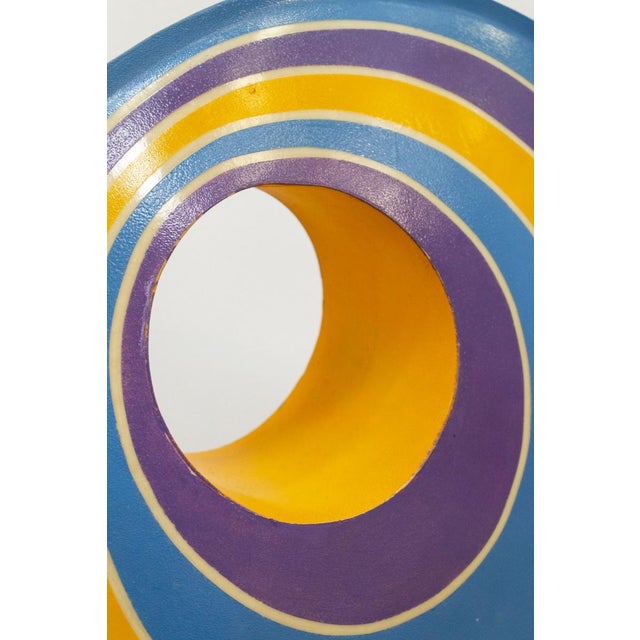 Fiberglass table or floor lamps Handcrafted with circular and blue spiral decorations. The bases are made of wood. They...