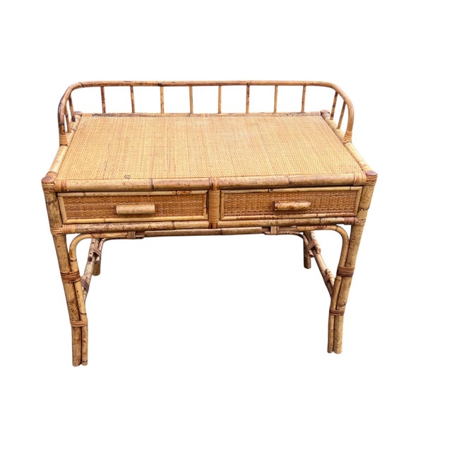 Vintage Rattan and Woven Wicker Writing Desk with Two Drawers Charming vintage rattan and woven wicker writing desk...
