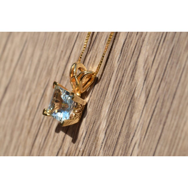 Contemporary The Knoll Court: Princess Cut Aquamarine Pendant in Yellow Gold For Sale - Image 3 of 4
