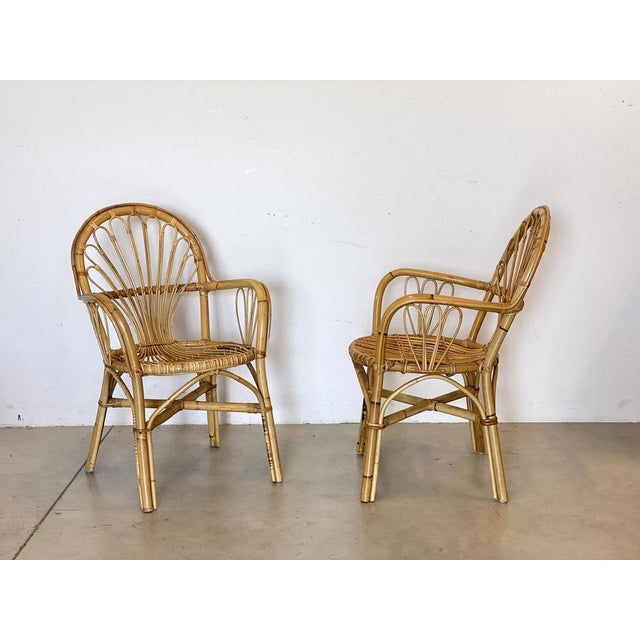 Pair of 70s armchairs in rush and bamboo
