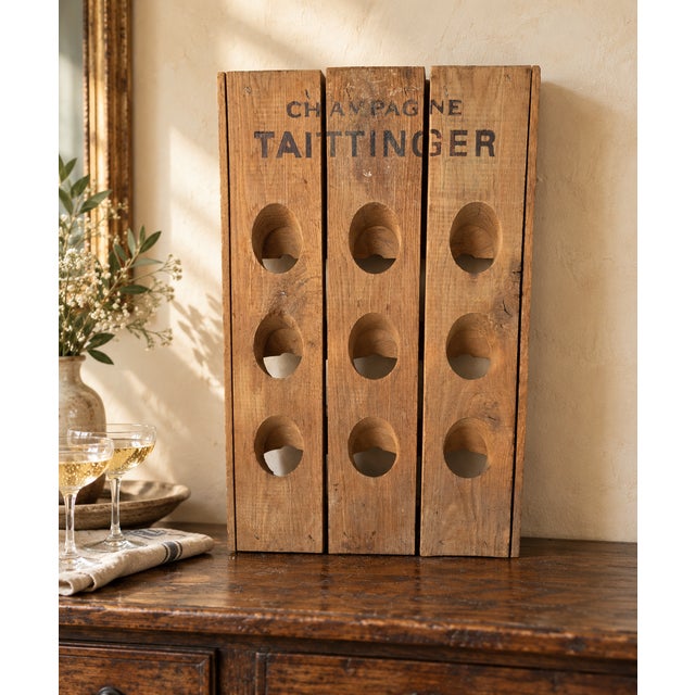 Bring the character of a French wine cellar to your home with this rustic wooden champagne riddling rack. Three vertical...