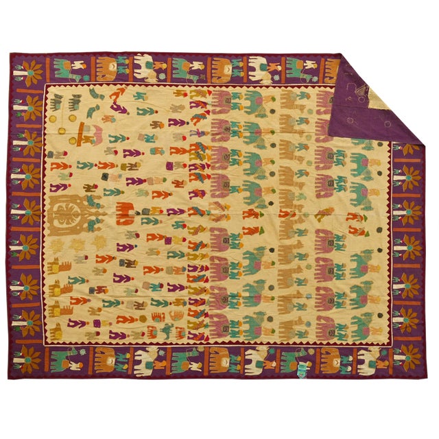 Steeped in tradition and rich with artisanal detail, this vintage Indian embroidered bedspread is a celebration of...