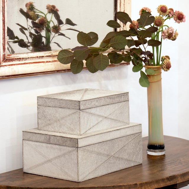Luxe hair on hide accents make this box an instant heirloom that's a joy to use. Ideal for storing mementos or office...