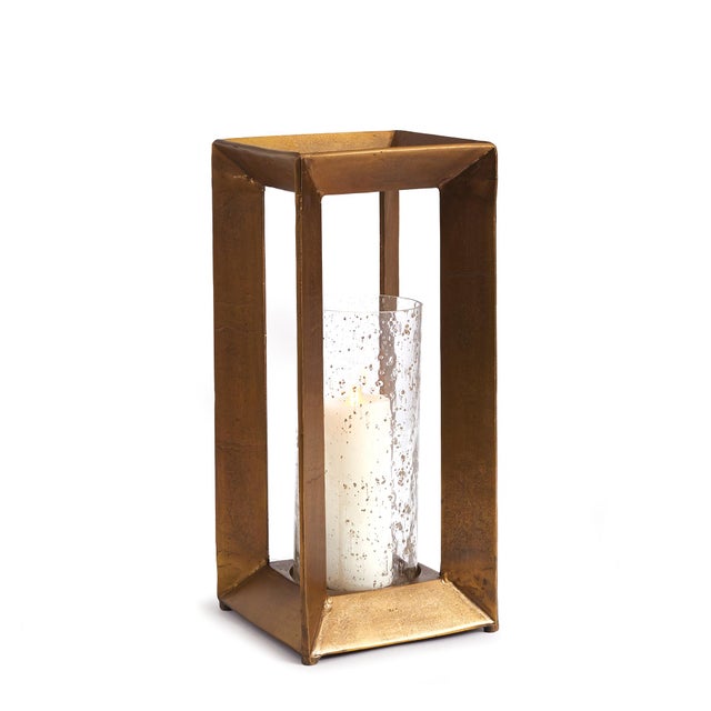This cast aluminum hurricane has a great presence. Strong and sturdy, it makes a solid accent. The seeded glass insert, it...