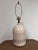 Design Plus Gallery presents a Floral Stoneware Jug Table Lamp. The ceramic jug-form base has a glossy cream glaze with a...