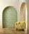 This surface-printed wallpaper translates beautifully on the wall with saturated tones of blue and green blurring the...