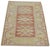 Hand-knotted with care using traditional rug-making techniques, this wool rug blends timeless craftsmanship with a modern...