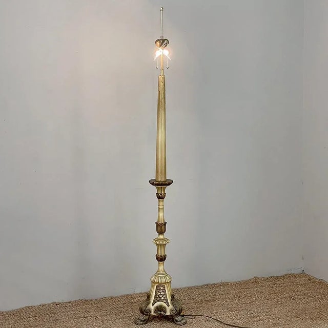 18th Century Hand-Carved & Painted Italian Candlestick Floor Lamp is a beautiful example of Italian carvings influenced by...