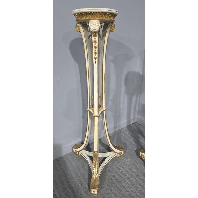 Very nice pair of English painted torchere stands oil and water parcel gilded, in very good overall condition. 4ft high...
