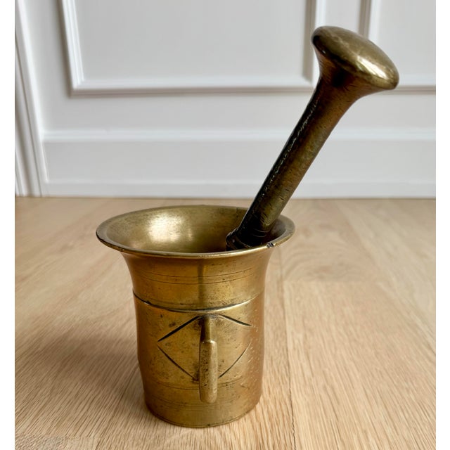 This 19th-century Austrian mortar and pestle is defined by its extraordinary heavy-gauge casting and refined geometric...