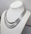 1970s rhodium plated 5 chain necklace with fold over clasp and extender. Marked "MONET©" on both the fold over clasp and...