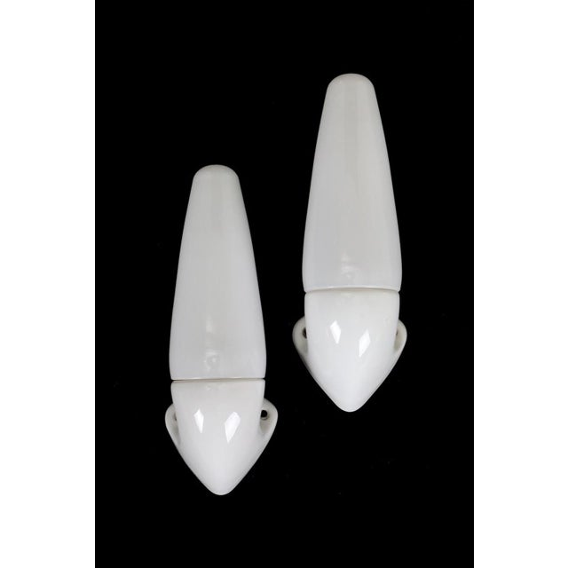 Set of two "6035" wall lamps by ifö, sweden. Made of ceramic and opal glass. Designed by stig carlsson, 1960s. Approx. 29...