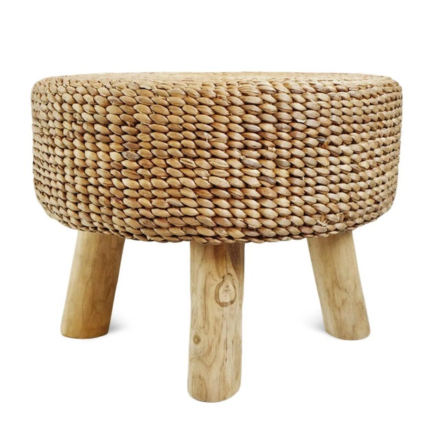 Vintage round natural banana leaf woven ottoman stool with raw wood legs. Great texture and natural warm color. Relaxed...