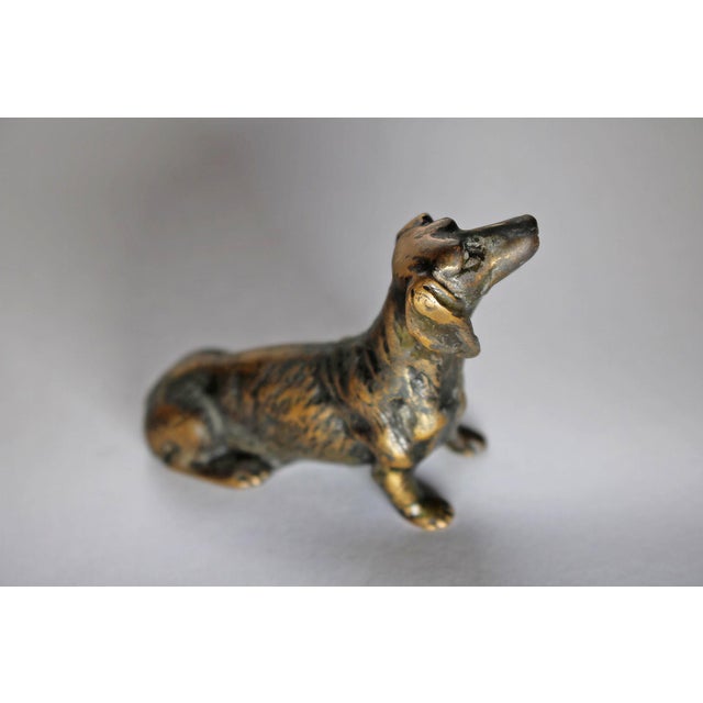 A beautiful miniature bronze sculpture, part of a collection.