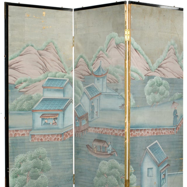 Early 20th Century Chinese Six Panel Floor Screen. This elegant Chinese folding screen presents in two three-panel...