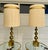 Here is an incredible pair of brass table lamps produced by Stiffel in the 1960's, designed by Tommy Parzinger. These...