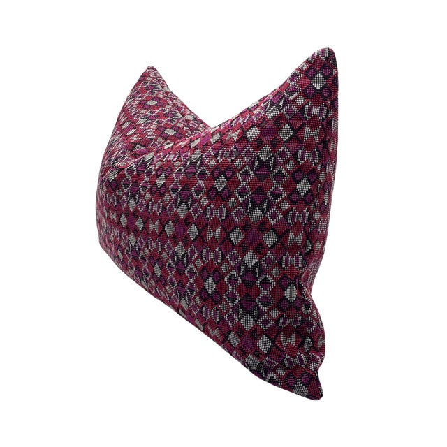 Pair of handcrafted pillows fashioned with a Designer Aztec pattern in pink fabric on the front and back. Meticulously...