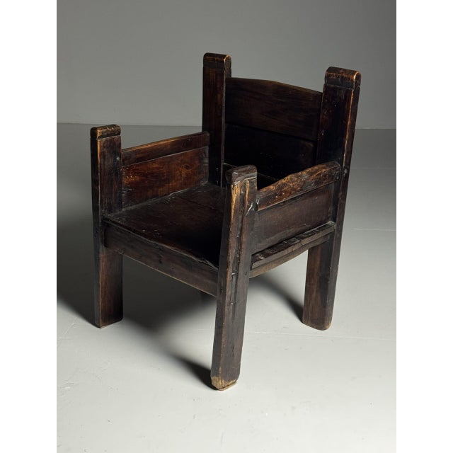 Large, robust chair. Originally from Spain, 18th century. Made of solid walnut wood. Very solid and sturdy piece of...