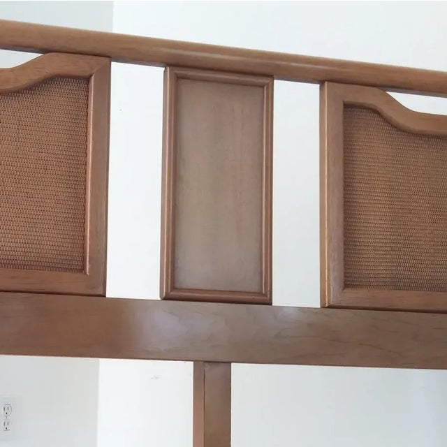 This headboard is from the 60s by American Martinsville. Its all hand made with walnut wood and hard wicker net panels....