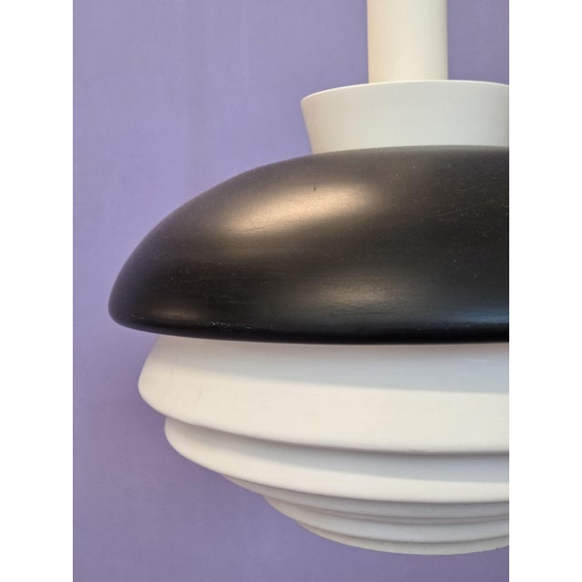 Artek A335A lamp, white and black, designed by Alvar Aalto and manufactured by Valaistustyö Ky. The lamp is in good used...