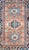 This early 20th-century Persian Heriz rug is a powerful example of the bold, geometric style for which the region is...