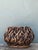 This vintage handcrafted woven rattan basket showcases the artistry of traditional hand weaving and likely dates to the...
