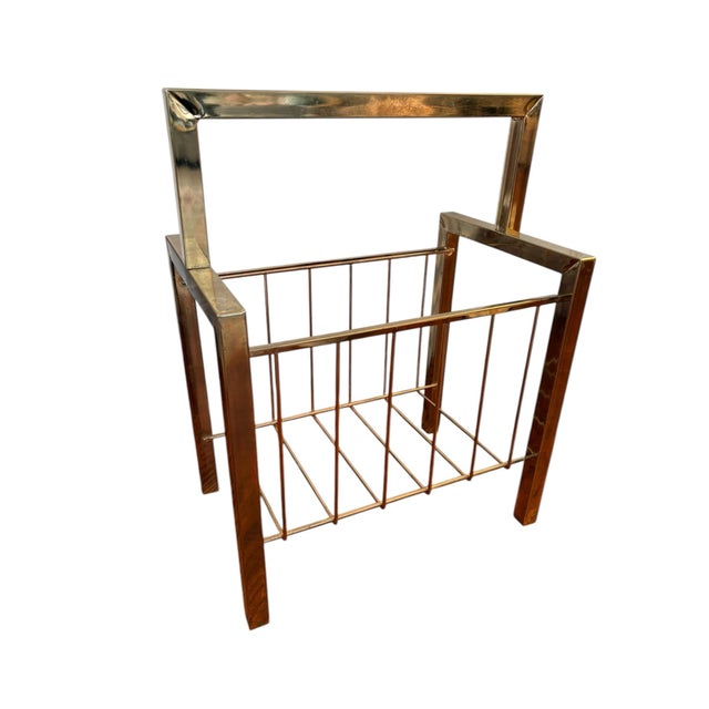 Vintage mid century modern magazine rack. This can hold books too. Light weight metal chrome style piece. Silver metal...