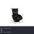 The Mate armchair from FSM is covered in black genuine leather and stands on an elegant, round metal base. The modern...