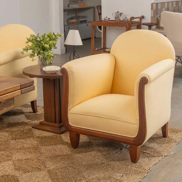 Incredible Art Deco club chair from France, 1920s. Beautiful curved wood frame with scroll details on arms. Newly...
