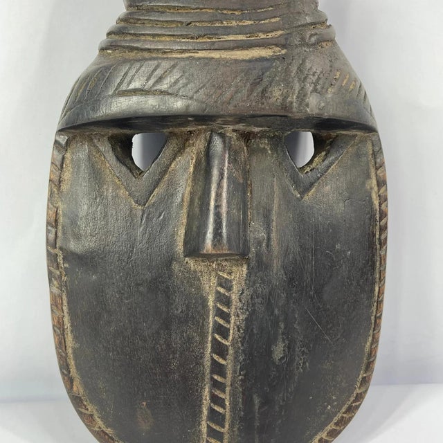 The Toma masks, exquisite and culturally significant, are striking embodiments of artistic prowess within the traditions...