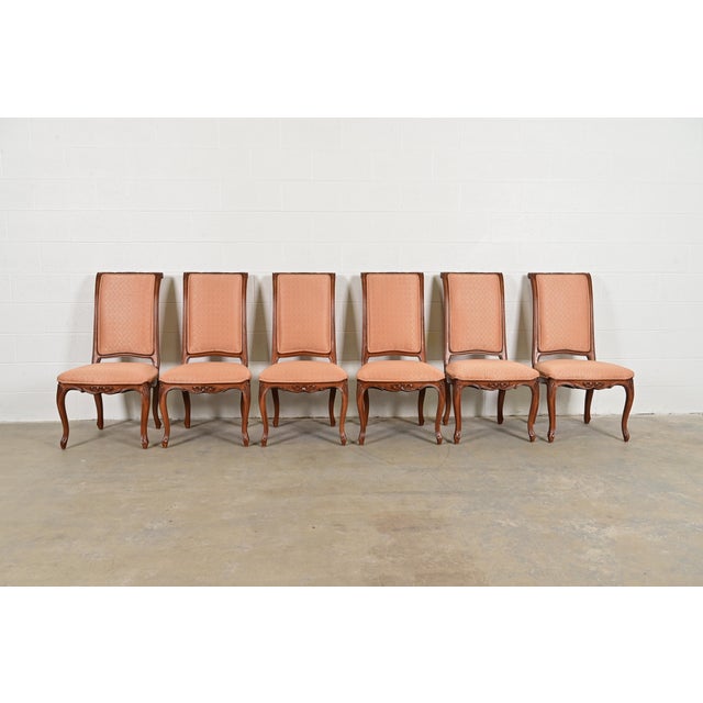 An outstanding set of six French Rococo or French Provincial Louis XV style dining chairs By Baker Furniture USA, Circa...