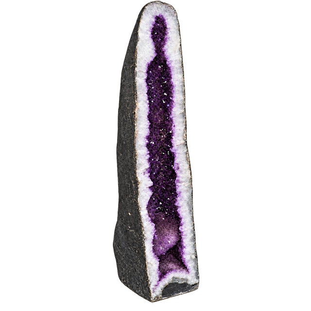 A monumental natural amethyst cathedral geode with exceptional scale, weight, and sculptural presence. Standing 53 inches...
