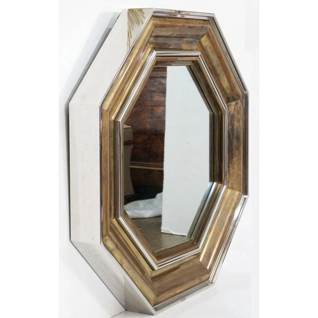 A beautiful large Italian octagonal brass and chrome mirror - designed by the famed Italian architect, Sandro Petti, for...