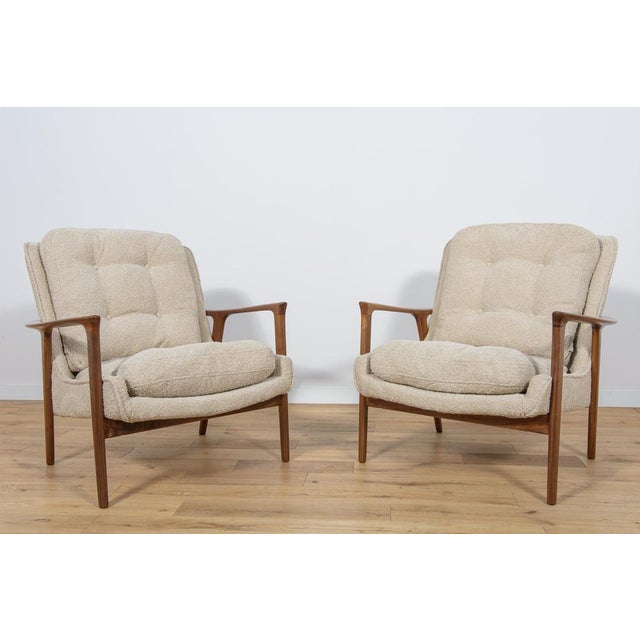 Armchairs were designed by Inge Andersson for the Bröderna Andersson manufacture. This set of two Swedish armchairs was...