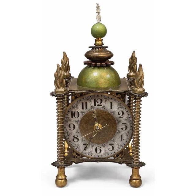 Design Plus Gallery presents a Skeleton Mantle Clock from Luna Bella. This metal clock has exposed gears and is made of...
