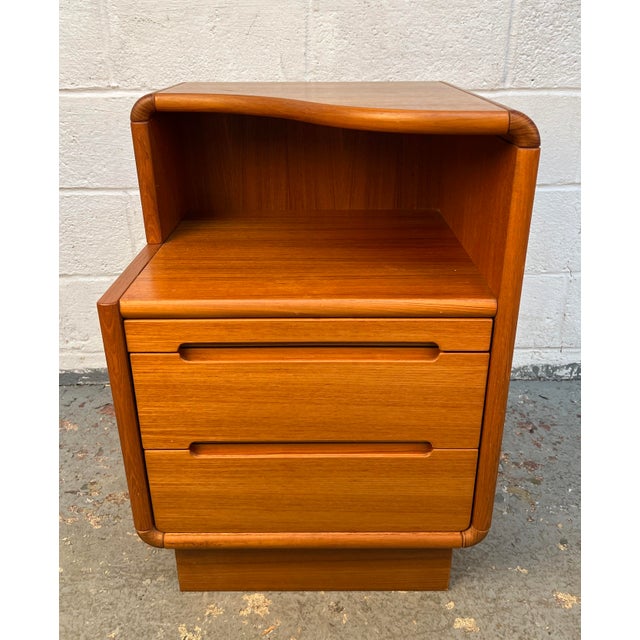 Beautiful vintage Mid-Century Modern teak nightstand by Sun Cabinet, featuring a rich warm teak finish, rounded edges, and...