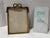 Decorative gilt metal frame with twisted rope border, ribbon bow crest, and tassel details. Measures approximately 8 x 10...