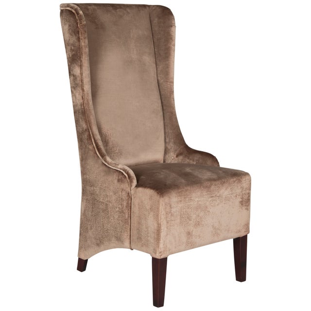 The Bacall high back chair, in dark champagne cotton fabric and cherry mahogany finished legs, absolutely commands...