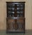 Sublime circa 1900 hand carved Jacobean Revival oak library bookcases with beautifully curved glass panes A very good...