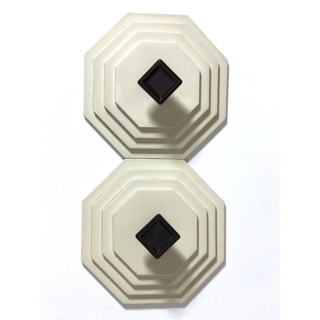 Splendid set of Beige coat hangers from the 70s, with a geometric and futuristic design inspired by the Spage Age style....