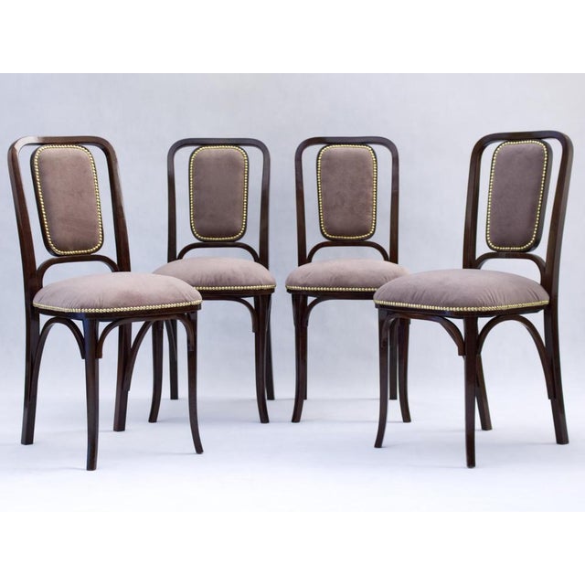 This beautiful set of 4 chairs from the Vienna Secession period was completely restored - refinished and reupholstered. It...