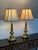 Design Plus Gallery presents a Pair of Cast Brass Table Lamps by Stiffel from the Mid 20th Century. They have a...