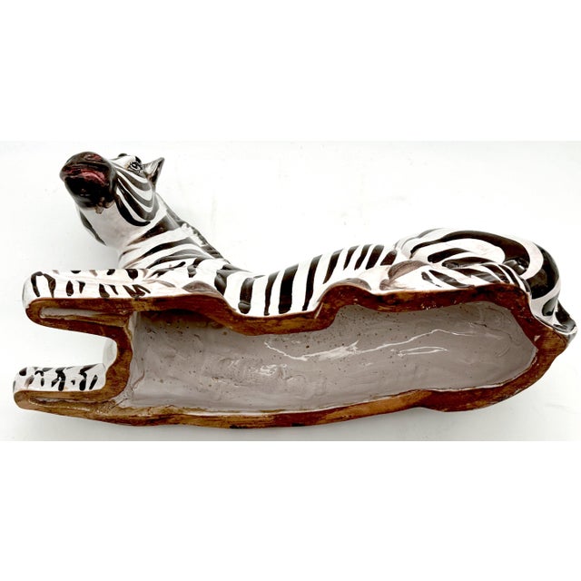 Italian Mid Century Porcelain Sculpture of Seated Zebra, Circa 1970s A striking Italian mid-century porcelain sculpture of...