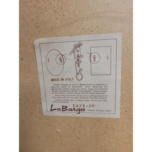 Fine bleached wood mirror by LaBarge. Exquisite style for and quality measuring 25 inches wide by 41 inches tall and 2...