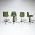 Set of four bar stools with green leather upholstery and black-lacquered frames with brass feet. The stools are height-...