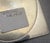 Sterling silver double frame with oval windows and marked STERLING to the inner wall. Thin slide-in Mylar window covers....