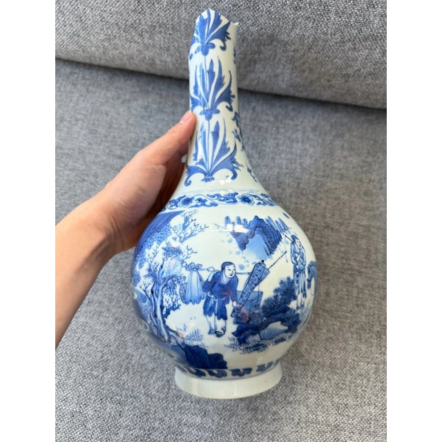 This is a highly important and rare example of Chinese porcelain from the Transitional Period. The vase features...