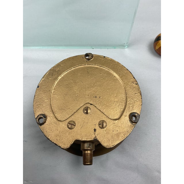 Ashton brass pressure gauge made in Boston Mass. Brass front with Iron back. Originally has glass front which is missing
