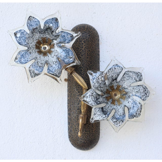 Pretty pair of wall light with Murano glass black flowers. Accommodates one E14 screw-in bulbs, European standards,...